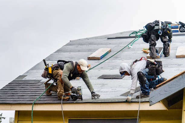 Professional Gutter Installation technician working in Corning, CA